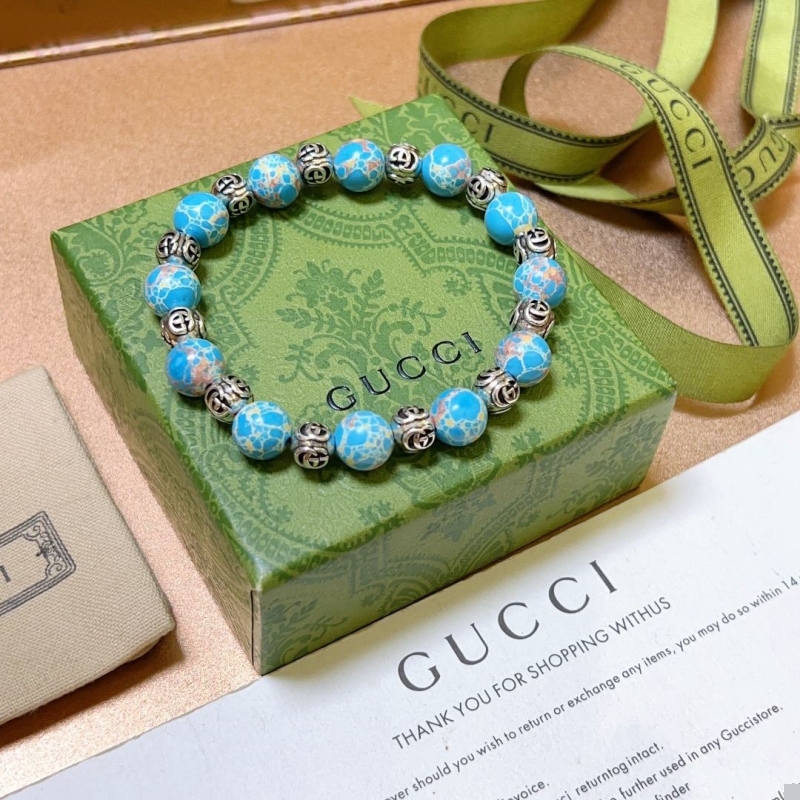 G*u*i bracelets
